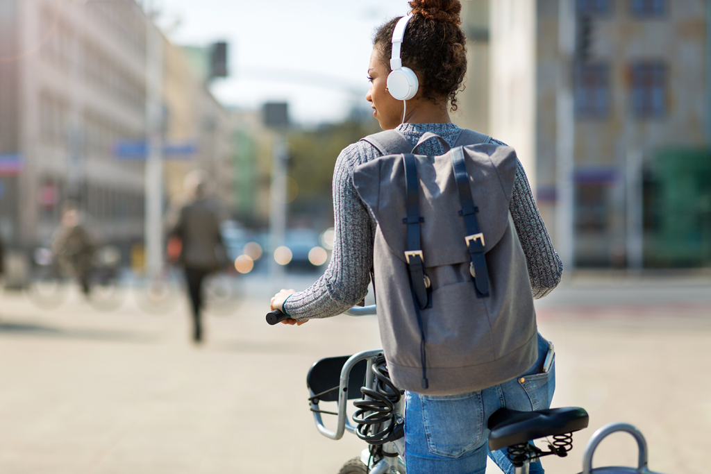 Woman on bike in city