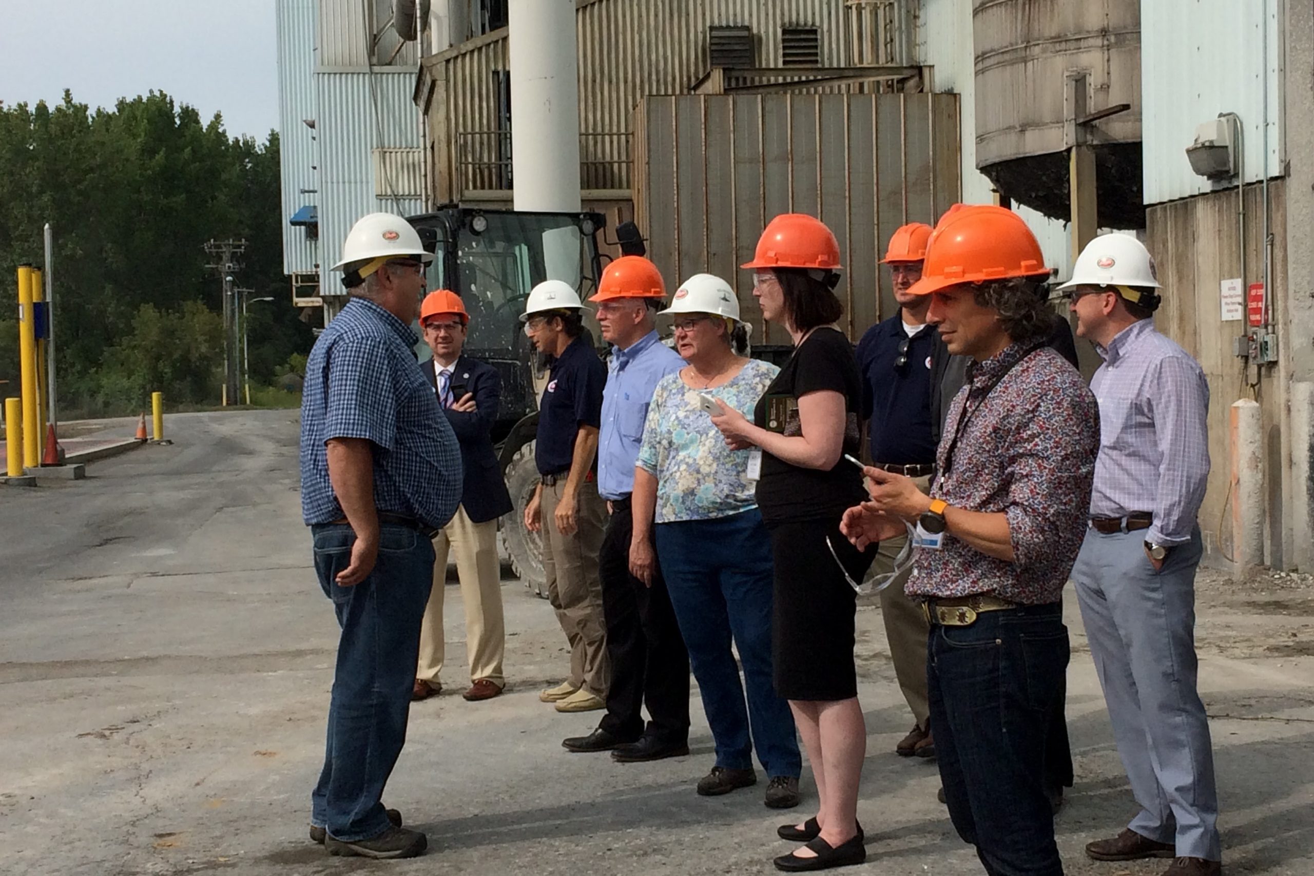 People touring generating station in Burlington, VT