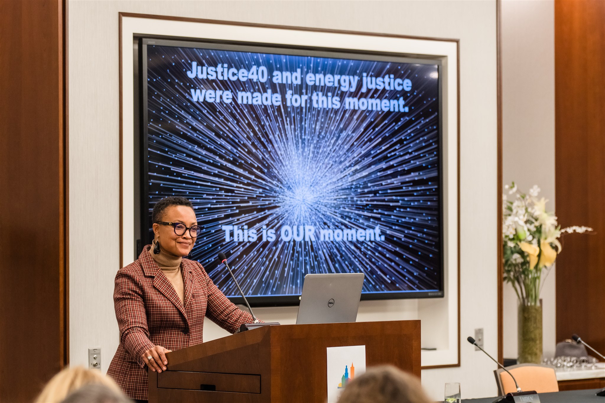 Shalanda Baker presents at a Mayors Innovation Project conference.