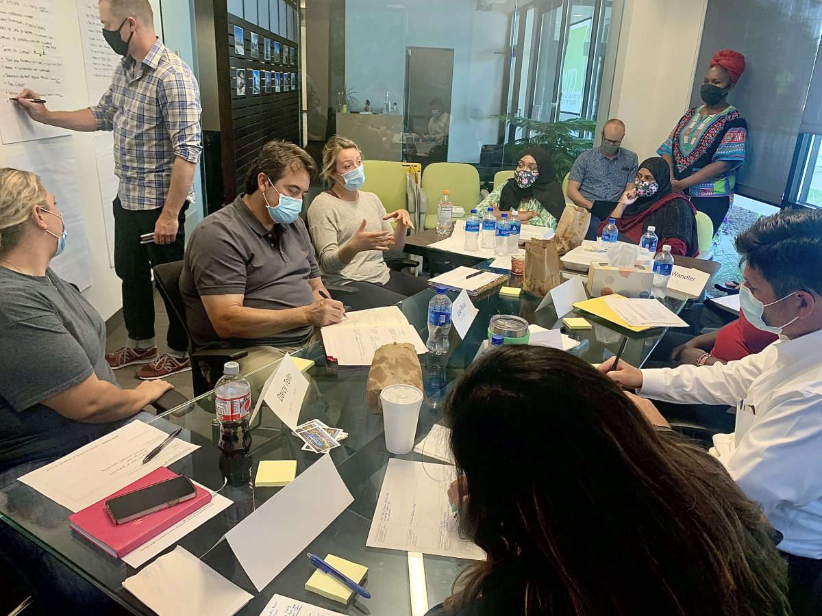 Rochester co-designers attend a meeting together
