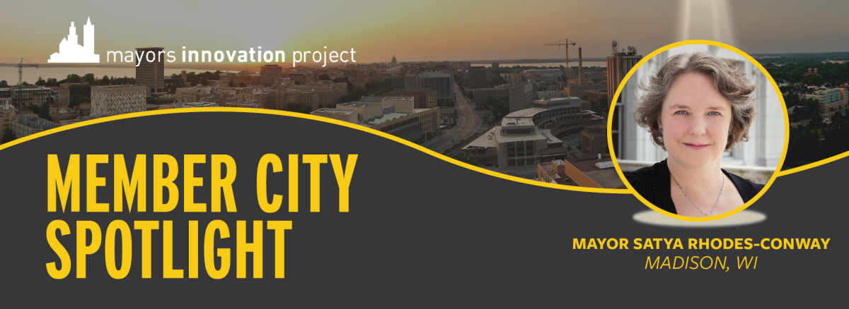 Graphic for Member City Spotlight article on Madison, Wisconsin. On the right there is a headshot of Madison Mayor Satya Rhodes-Conway.