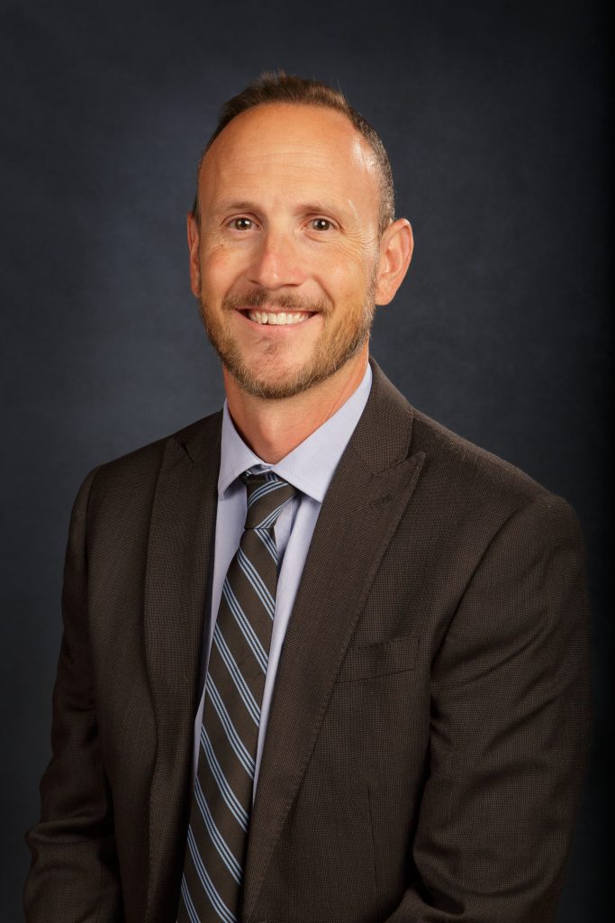 Headshot of Adam Krueger