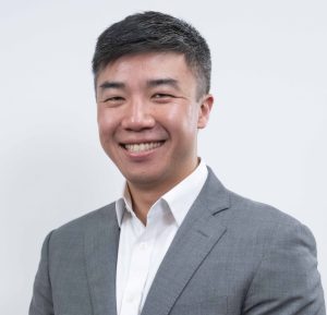 Headshot of Spencer Lau, Senior Director of NextStreet