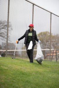 Des Moines, IA Mayor Connie Boesen plants trees. 