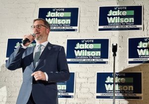 Mayor Jake Wilson campaigns in Somerville, MA.